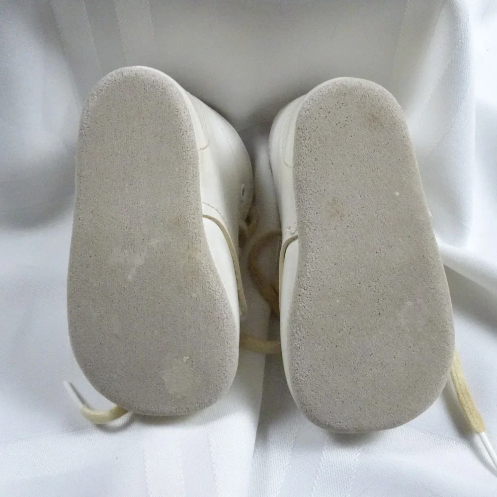 2 Sets Of Vintage Infant shoes. White pair and a Gray/Red pair.